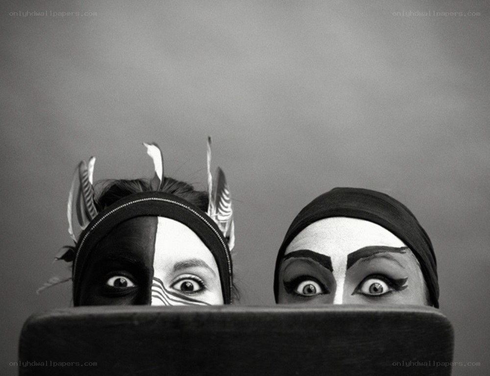 two performers with theatrical makeup