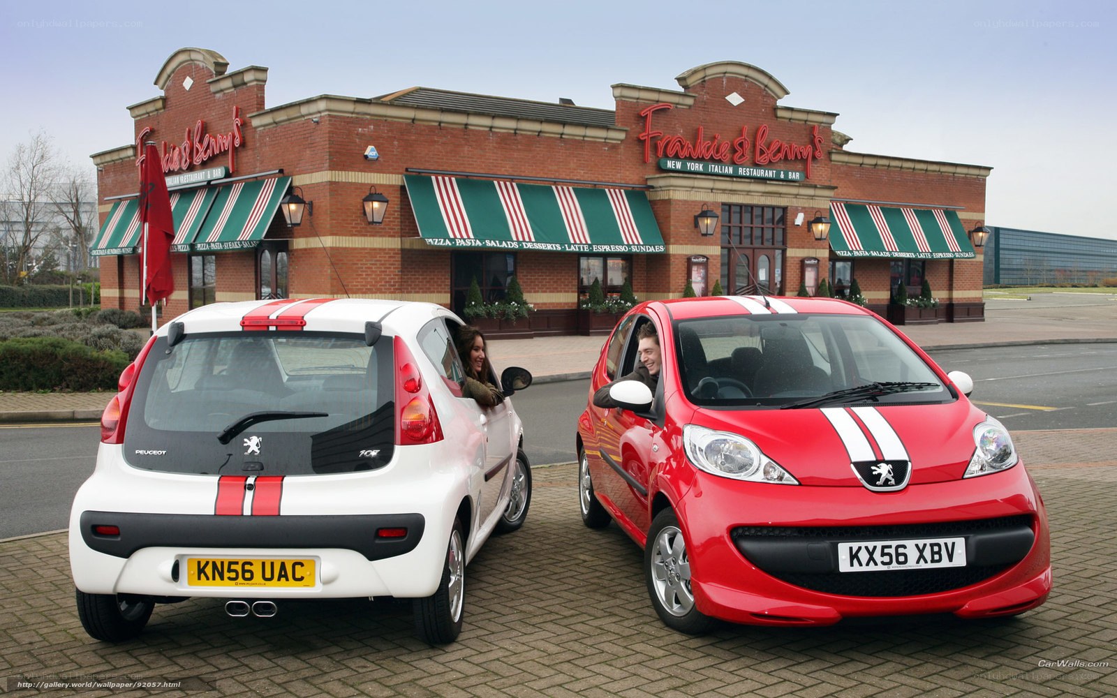 Two Peugeot 107 cars at a restaurant