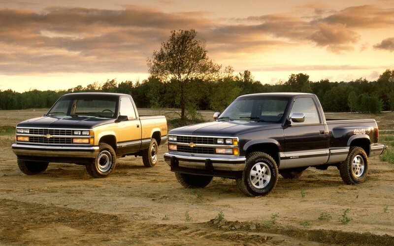 Two Pickup Trucks — Black, Serene