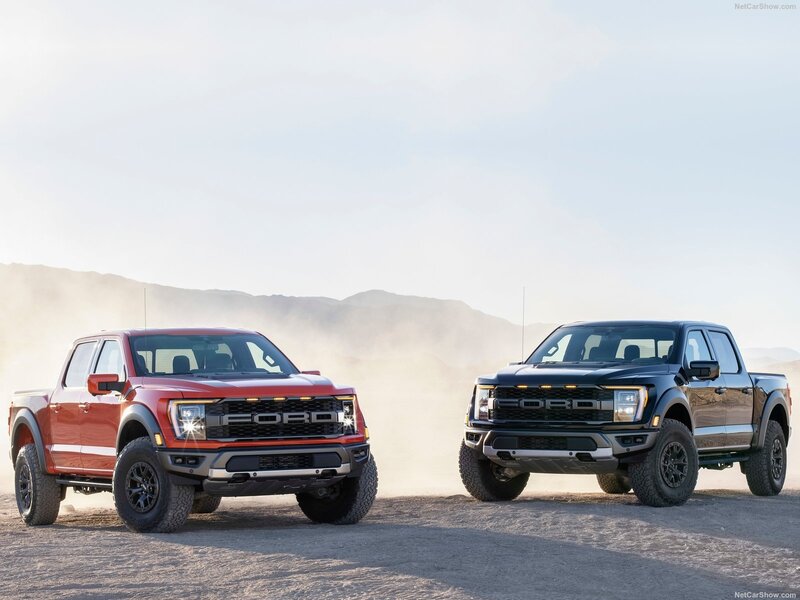 Two Pickup Trucks — Red, Dramatic