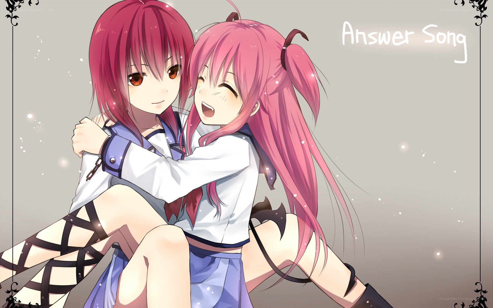 Two pink-haired girls hugging