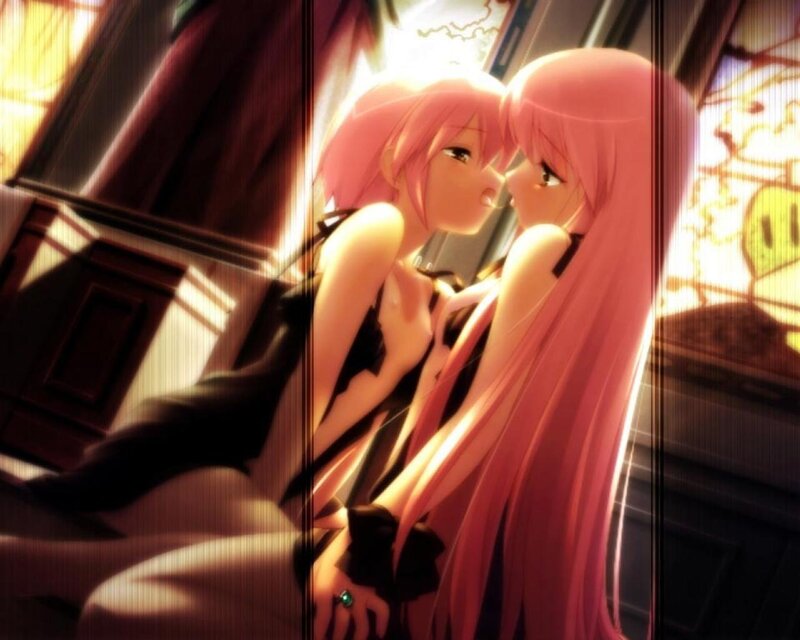 two pink-haired girls in a car