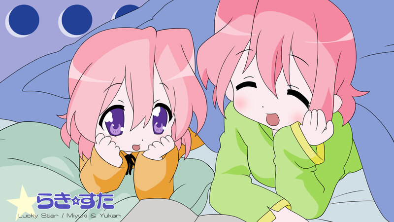 Two pink-haired girls in pajamas