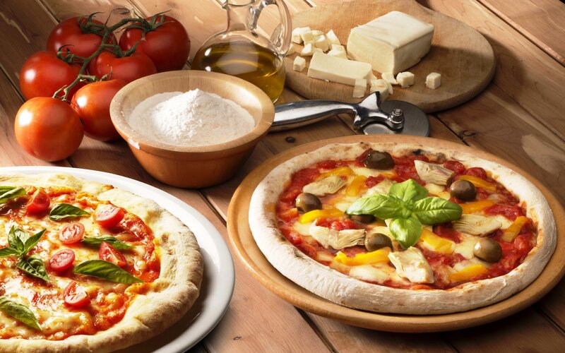 Two Pizzas on Wood — Brown