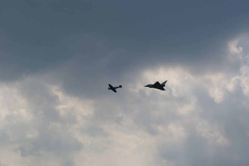 Two planes flying in the sky