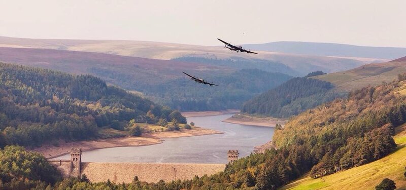 Two Planes Flying over Dam