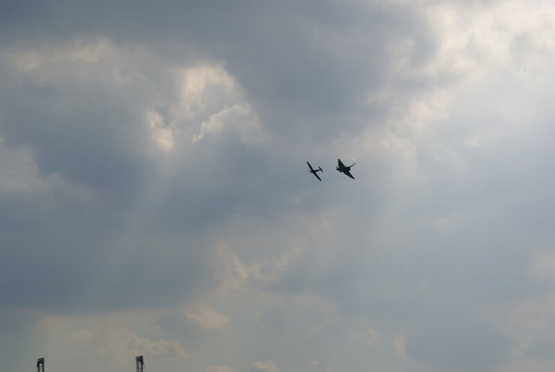 Two planes in cloudy sky