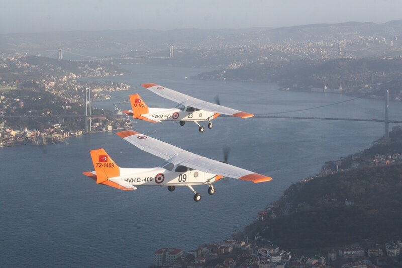 Two planes over a city