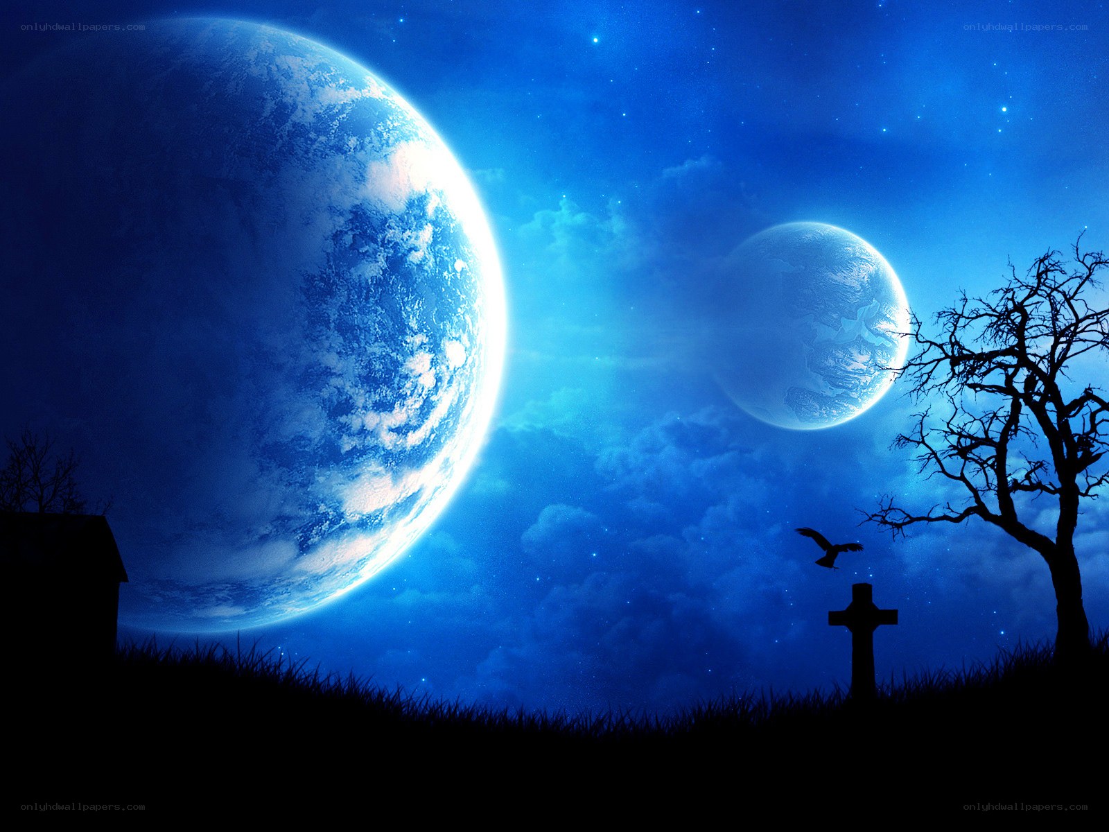 Two planets in a blue sky
