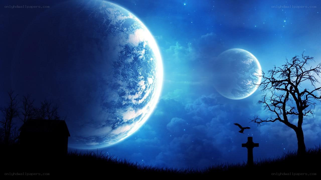 Two planets in a blue sky