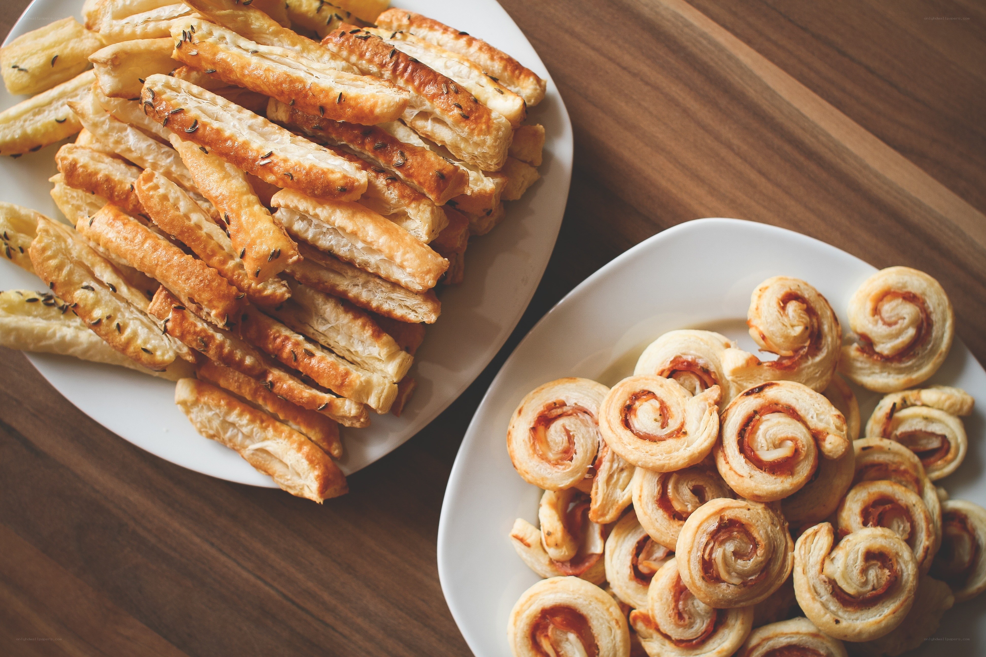 Two plates of pastries