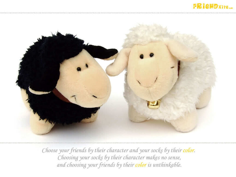 Two plush sheep friends