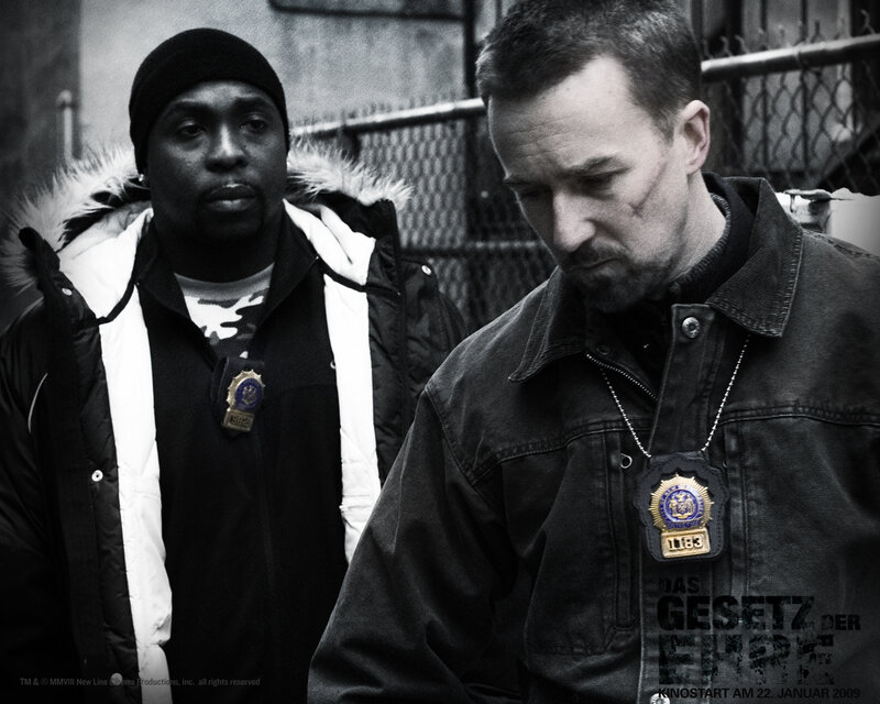two police officers in urban setting