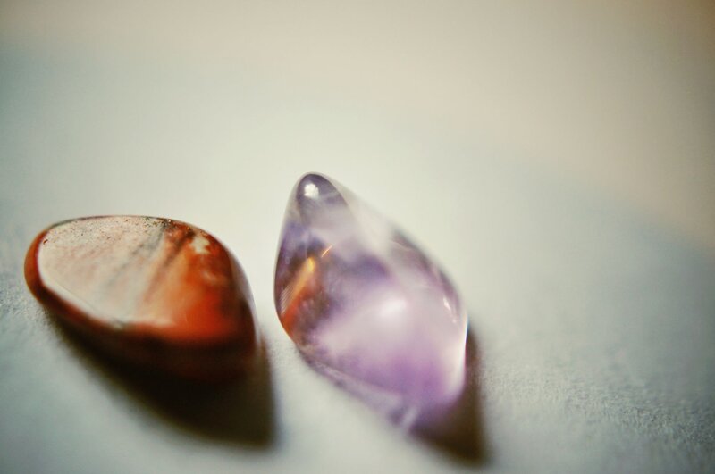 Two polished gemstones