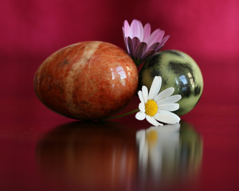 Two Polished Stones with Flowers