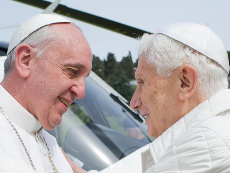 Two Popes Interacting