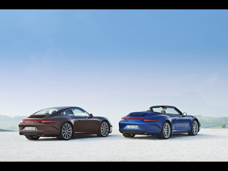 Two Porsche 911 cars side by side