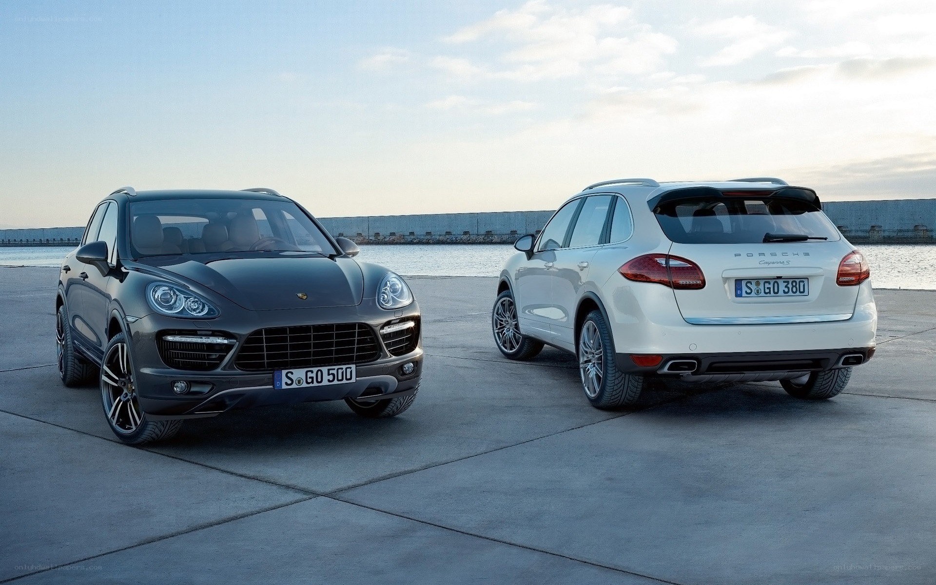 Two Porsche Cayenne SUVs
