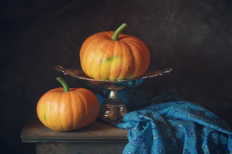 Two Pumpkins on Table