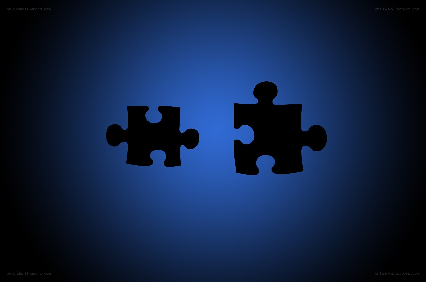Two puzzle pieces on blue