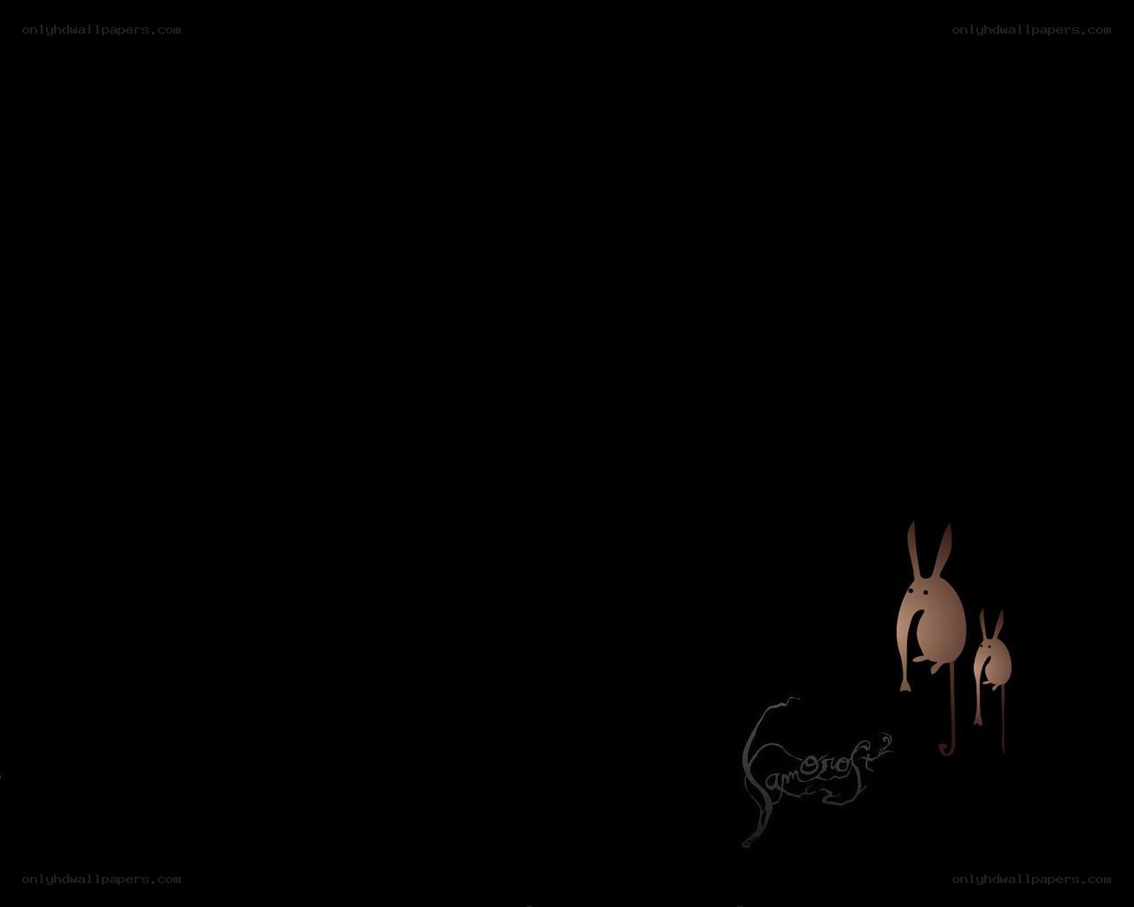 two rabbits on black background