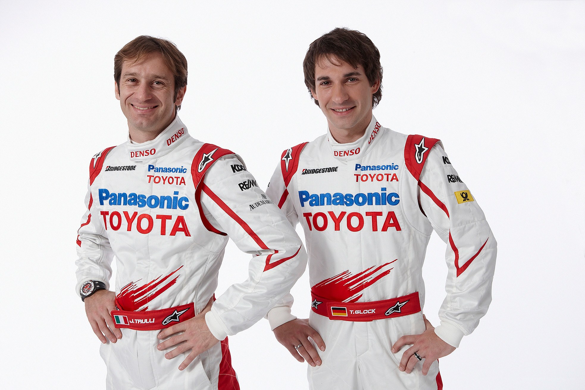 Two race car drivers in suits