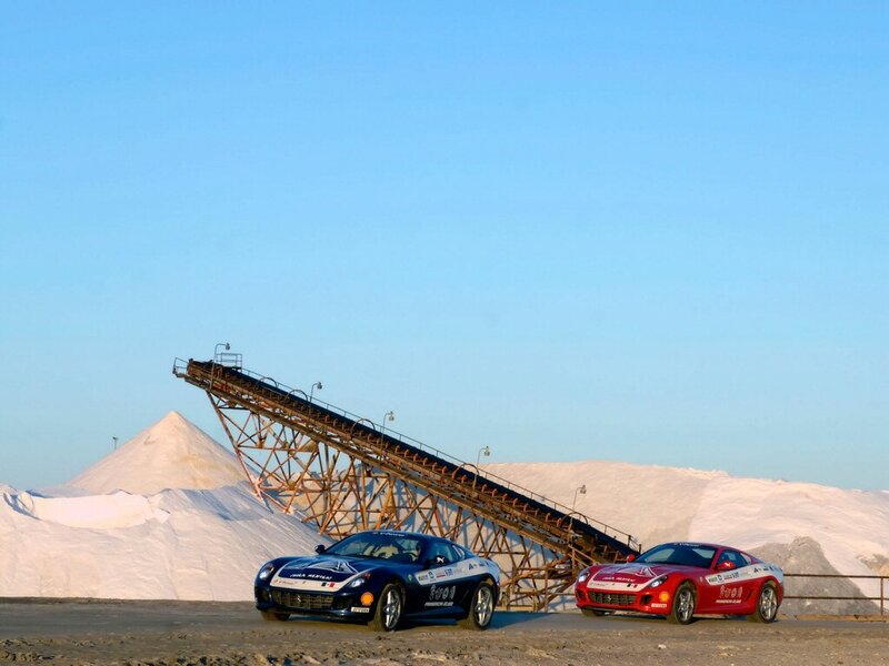 Two race cars at a salt mine