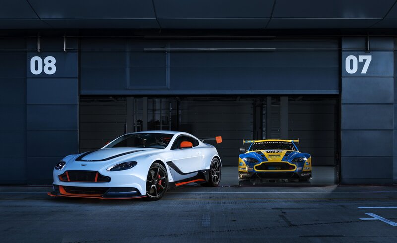 Two Race Cars in Garage — White