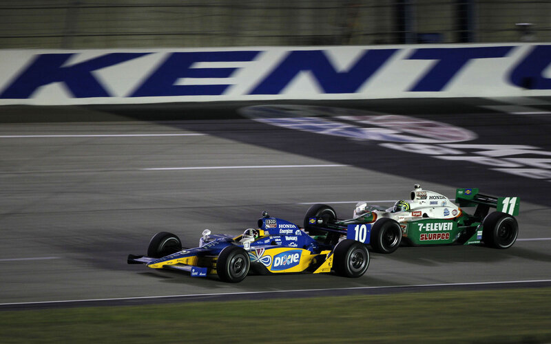 Two Race Cars on Track — Blue