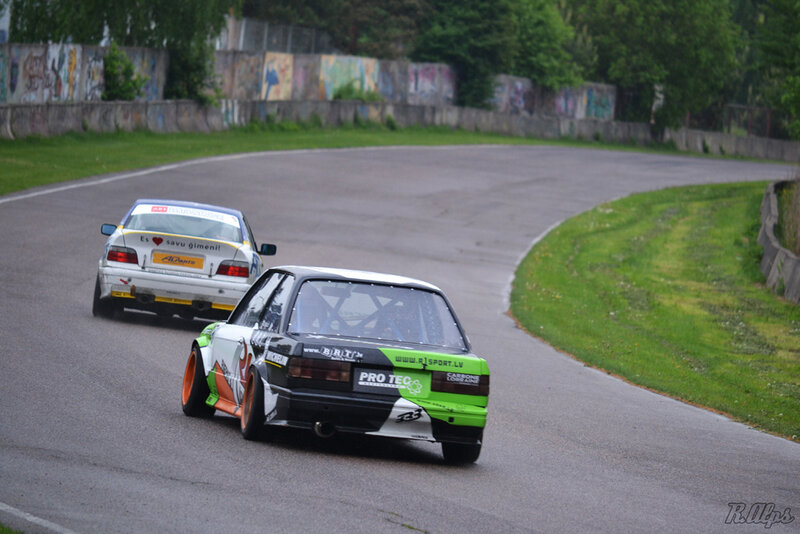 Two Race Cars on Track — Green
