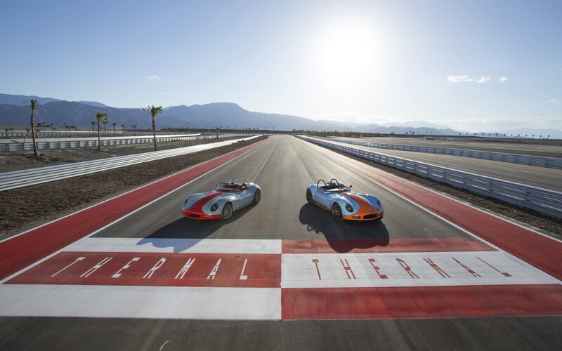 Two Race Cars on Track — Red, Serene