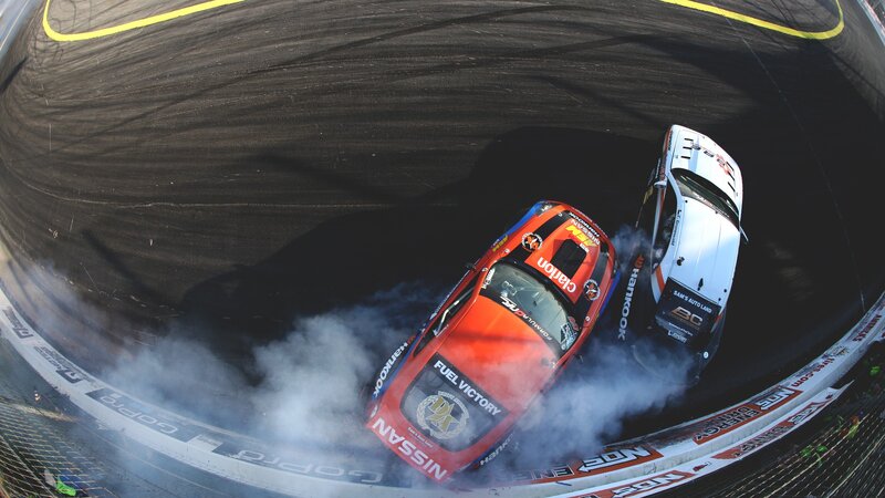 Two Racing Cars Drifting