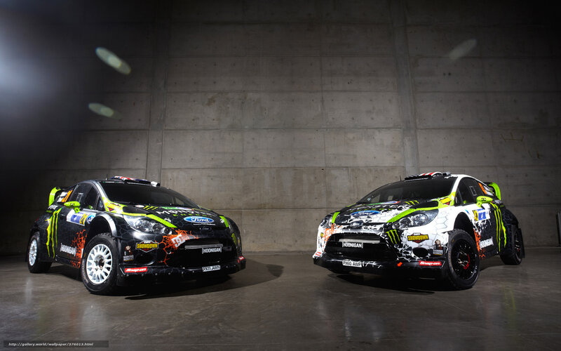 Two rally cars in a garage