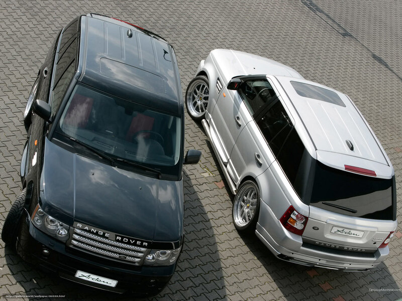 Two Range Rover SUVs on pavement
