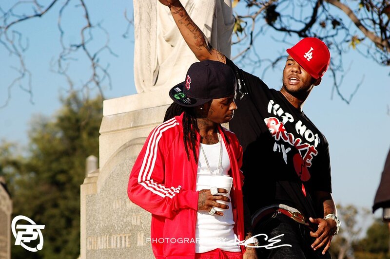 Two rappers at a monument