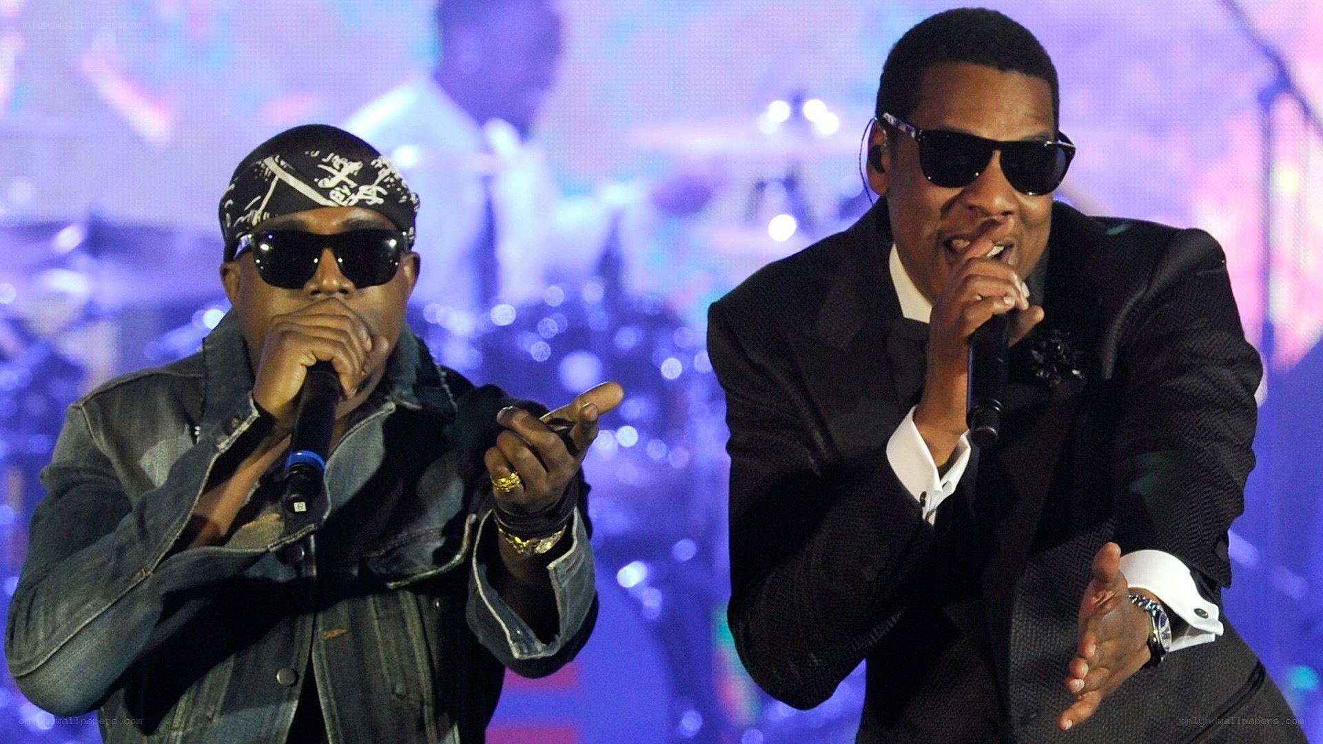 Two rappers performing on stage
