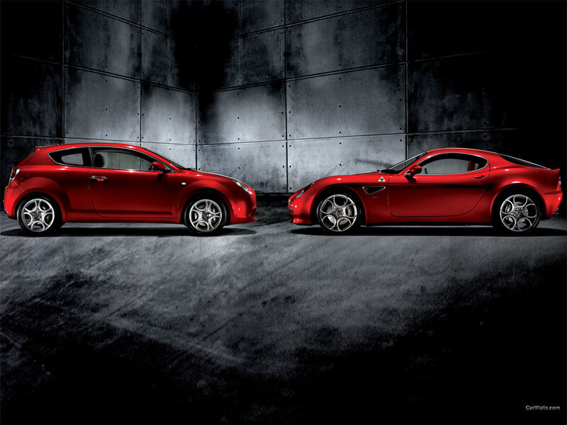 Two red Alfa Romeo cars