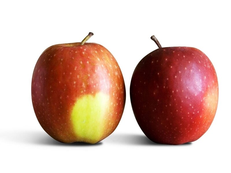 two red apples on white