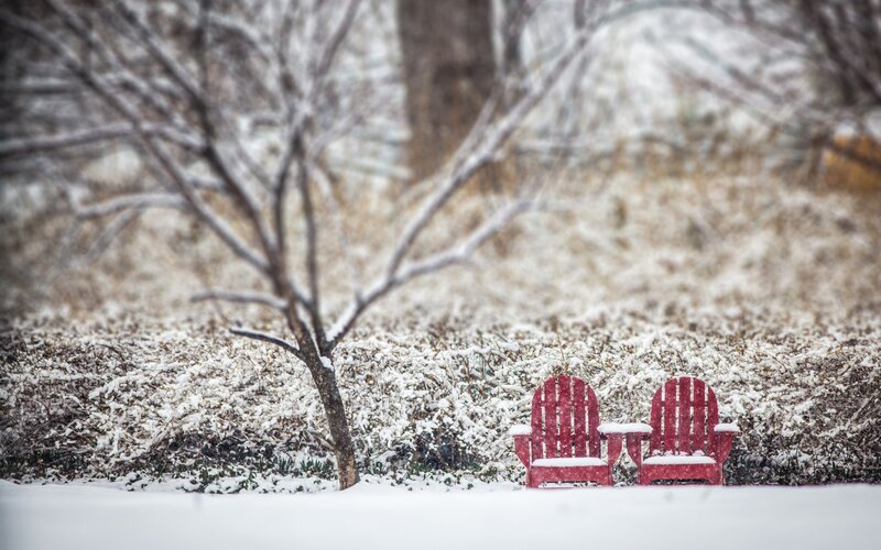 Two Red Chairs in Snow