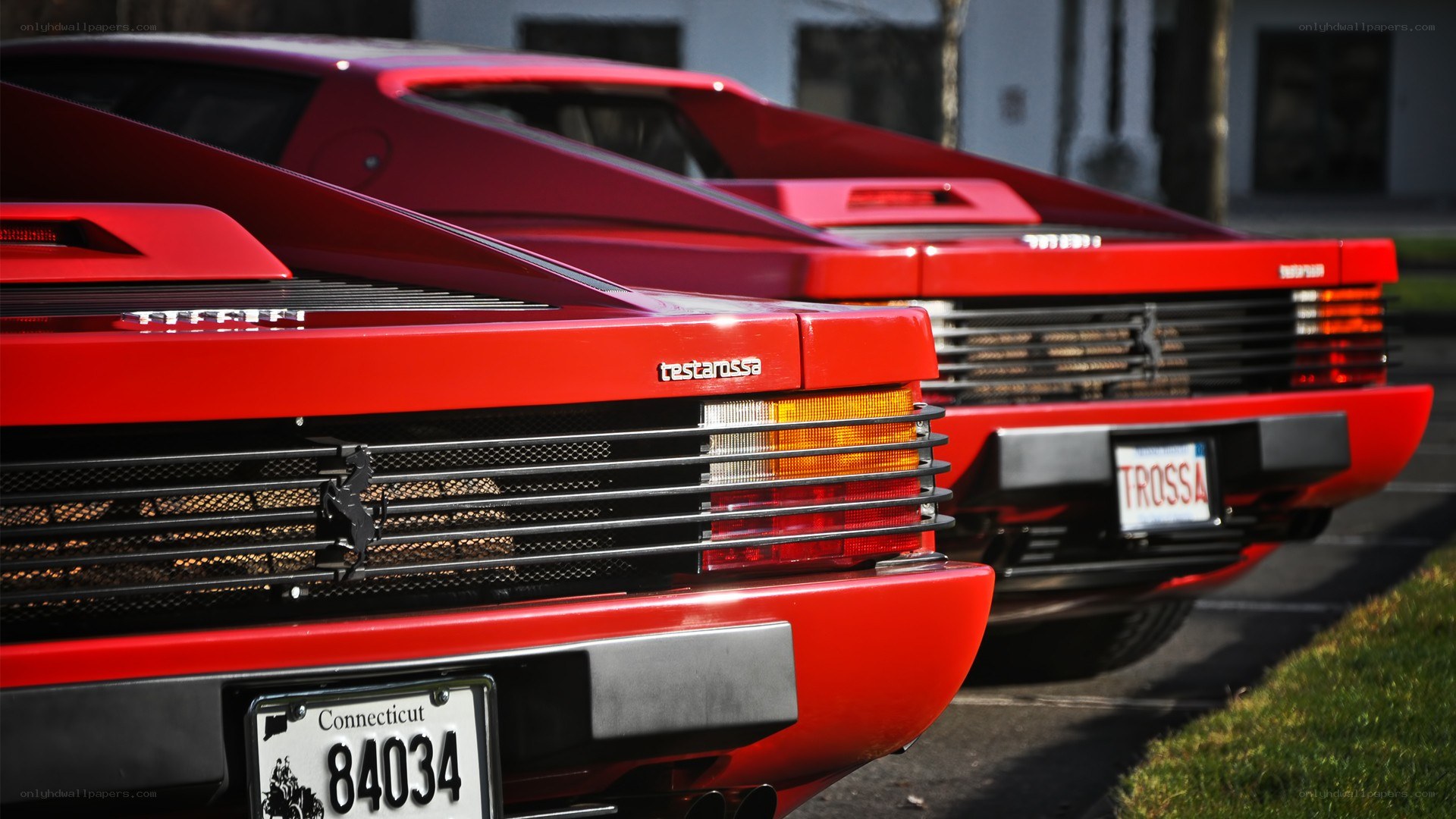 Two red Ferrari Testarossas