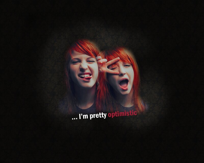 two red-haired girls smiling