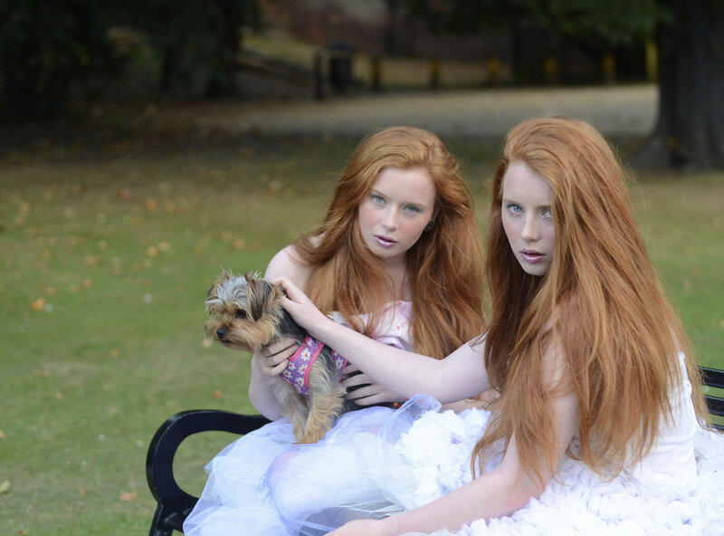Two Red-haired Women with Dog