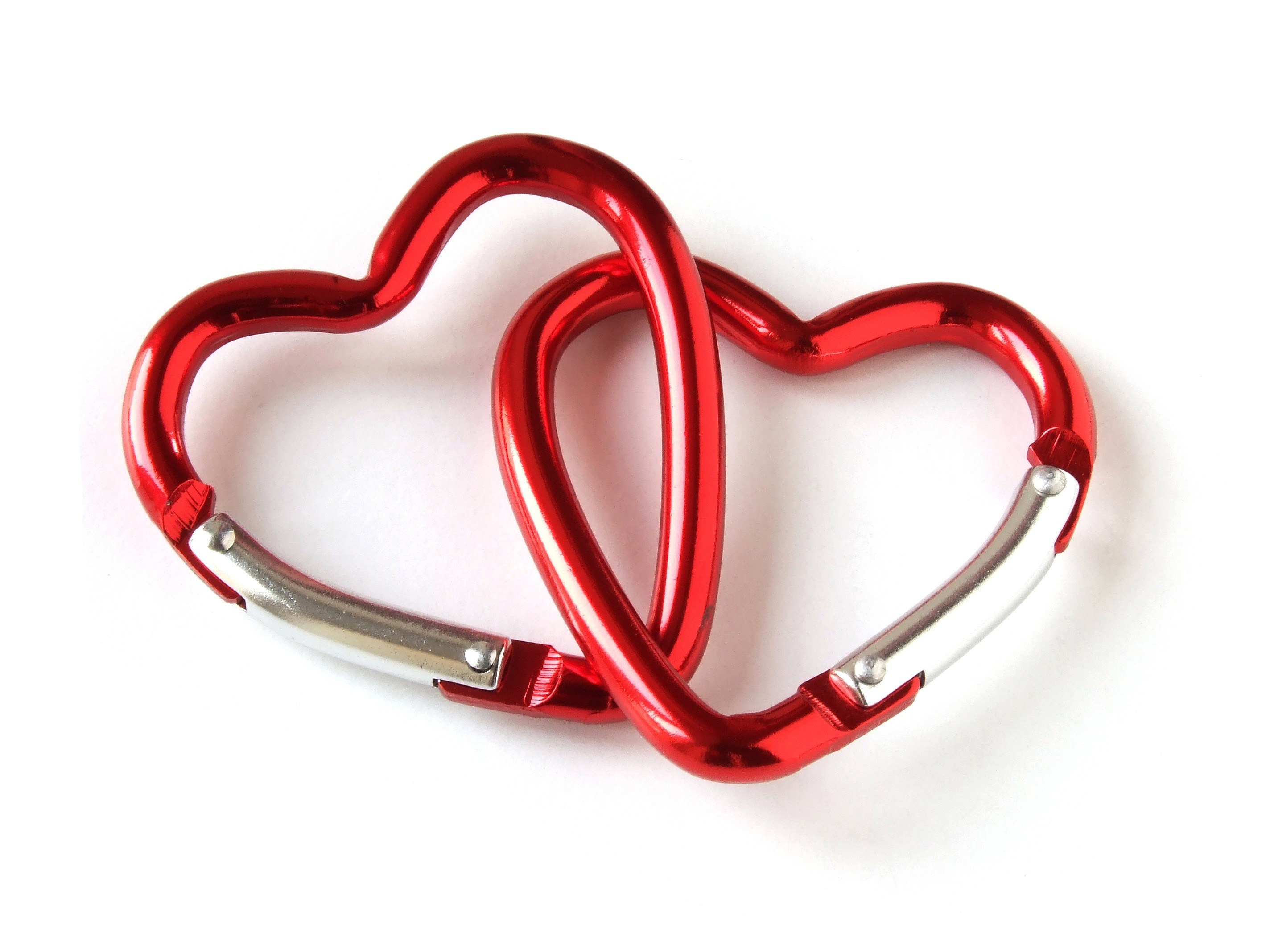Two red heart-shaped carabiners