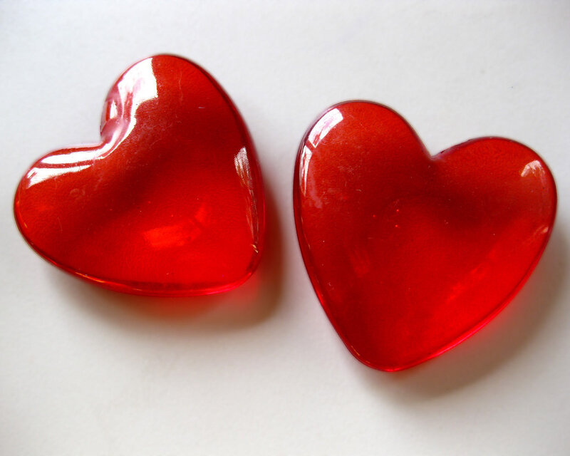 Two Red Heart-shaped Objects