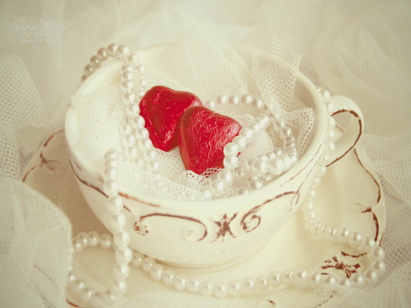Two Red Hearts in a Cup