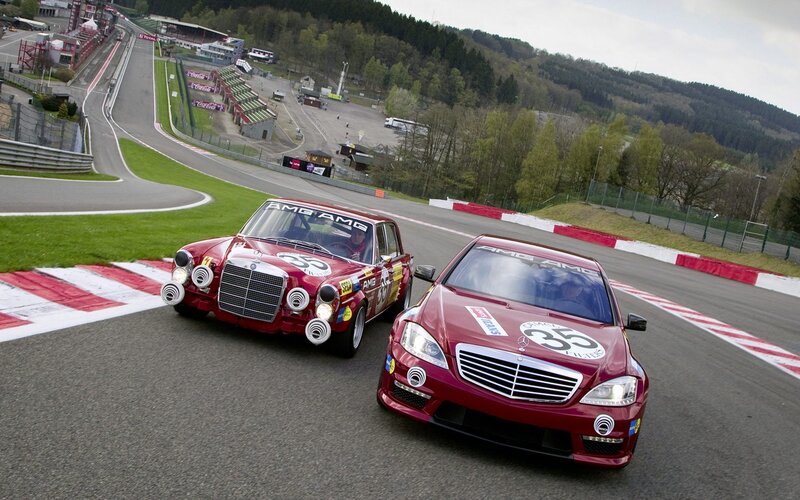 Two red Mercedes AMG race cars