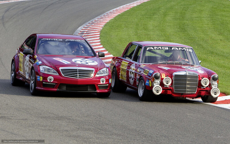 Two red Mercedes AMG race cars