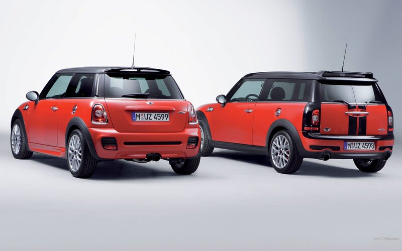 Two red MINI cars side by side