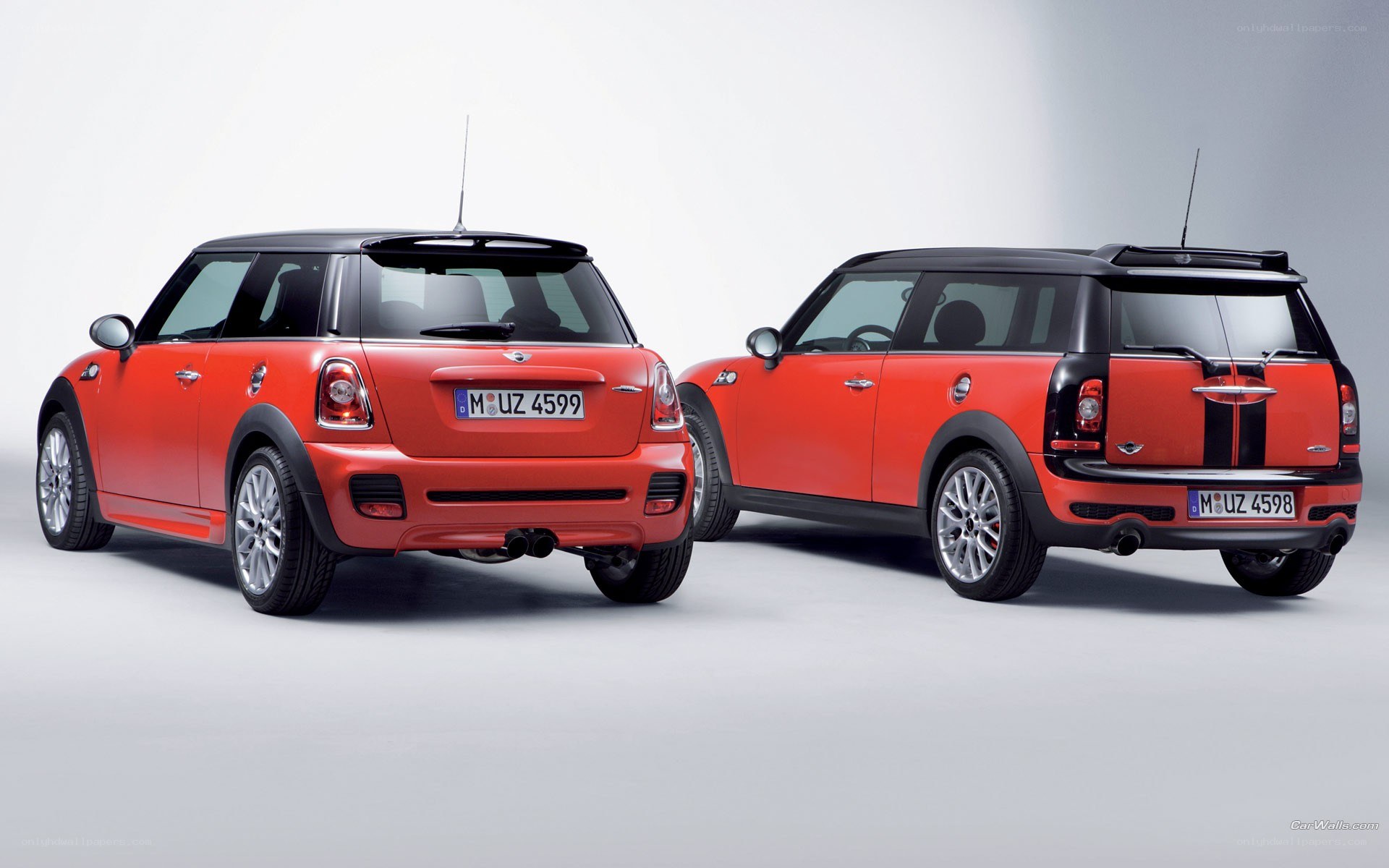Two red MINI cars side by side