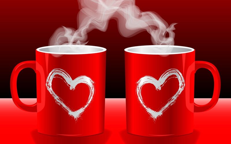 Two red mugs with hearts